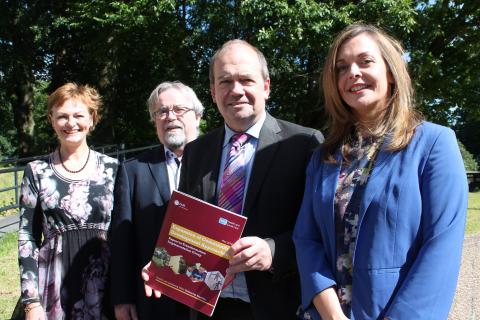 Photo caption: Mary Black (Assistant Director of Public Health, Public Health Agency), Seamus McAleavey (Chief Executive, NICVA), Dr Michael McBride (Chief Medical Officer) and Joanne Morgan (Director, Community Development and Health Network) launch the new report – ‘Expansion of Community Development Approaches’. 